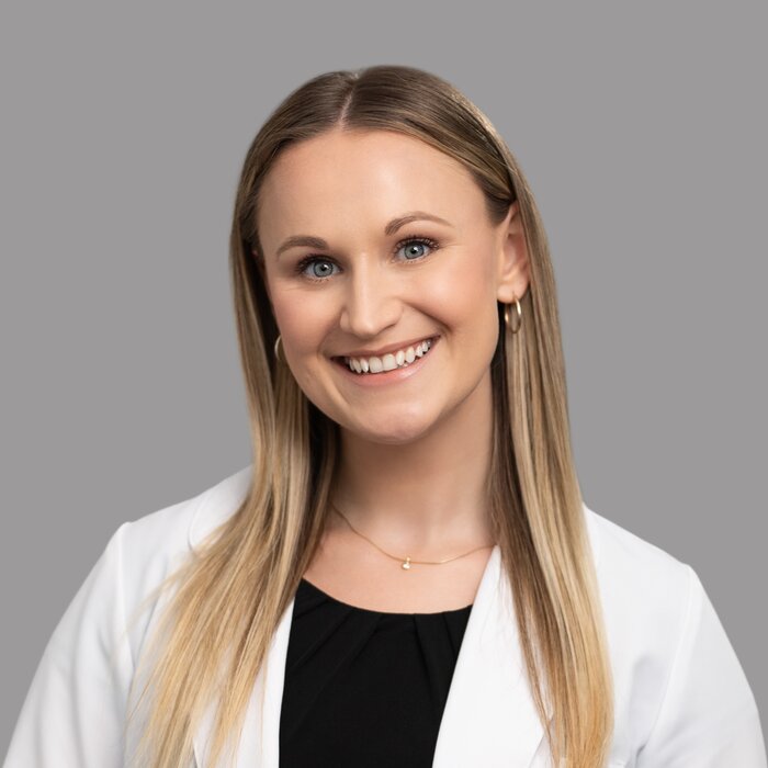 Katie, PA-C in dermatology and WealthRx client